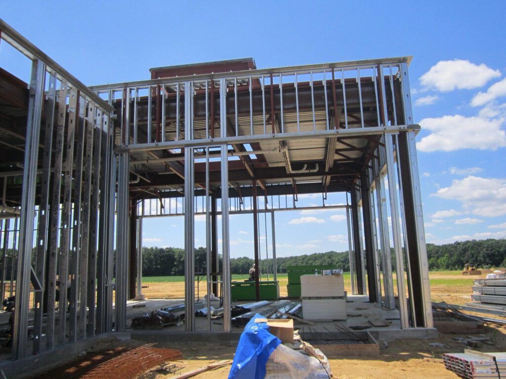 Two-storey structural steel frame with light-gauge steel stud infill